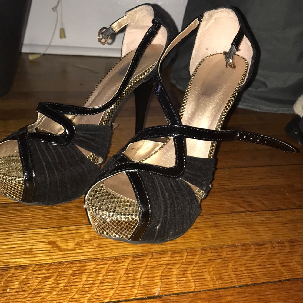 Gold and black heels